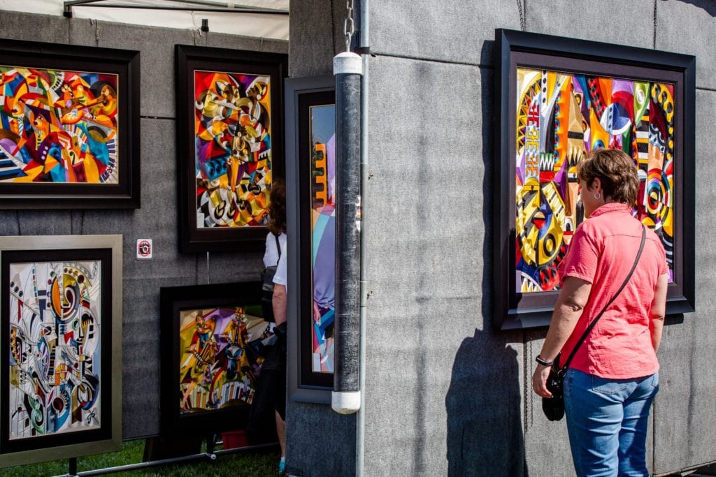 Lady viewing a picture at the Summerlin Festival of Arts